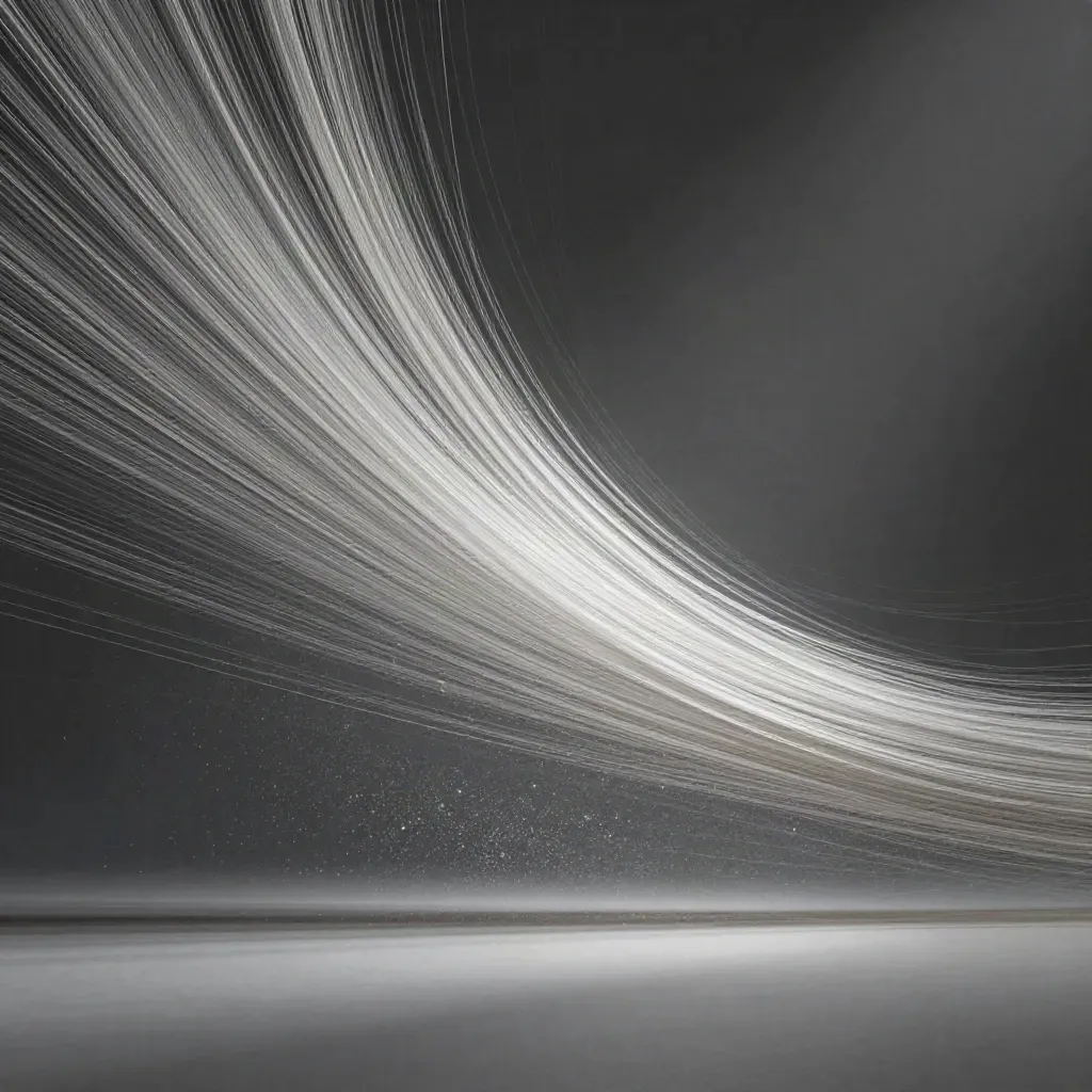Silver filaments converge into a white bloom in dark graphite haze.